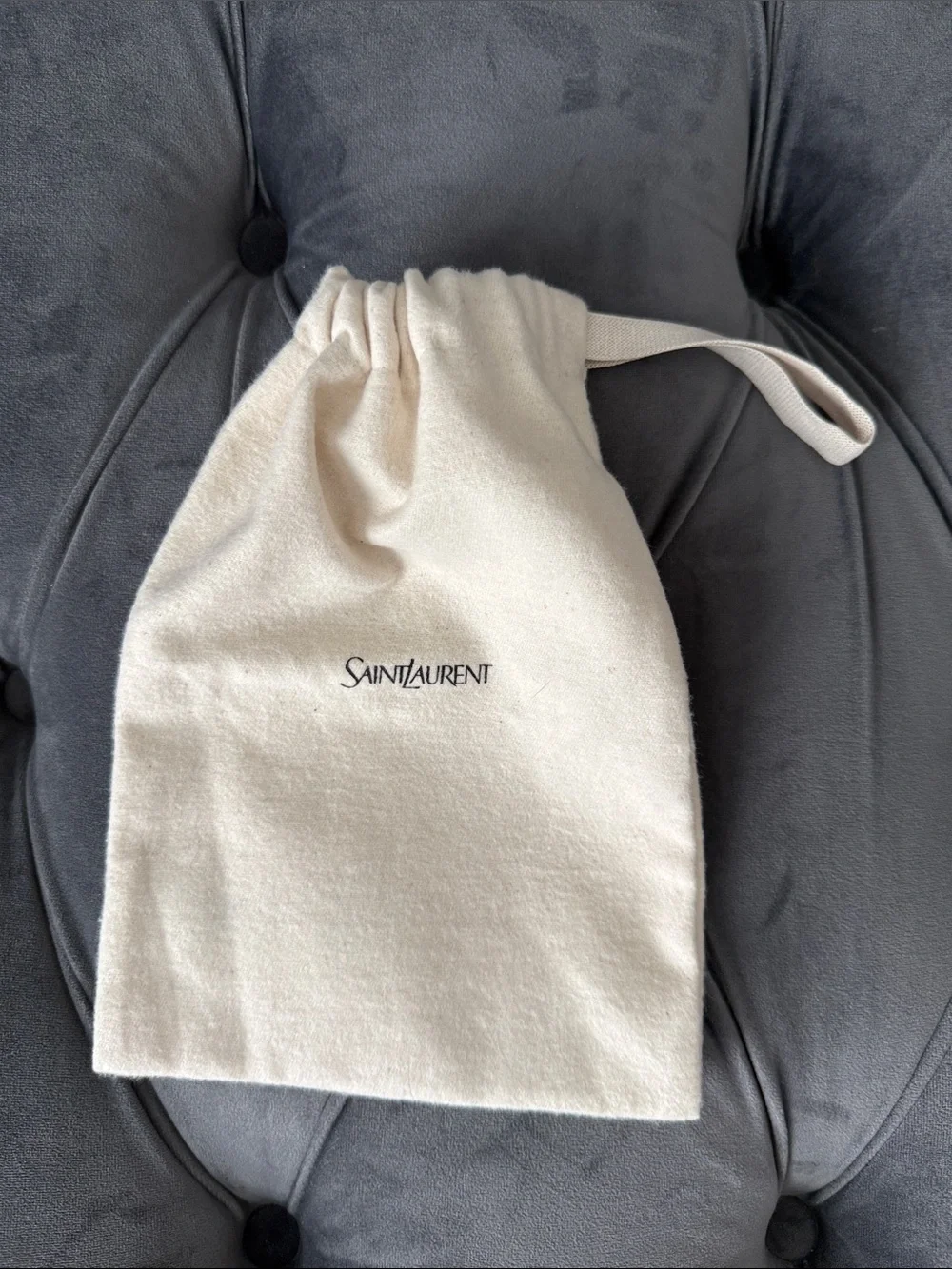 Yves Saint Laurent Cream Dust Bag with Black Logo for belt accessories